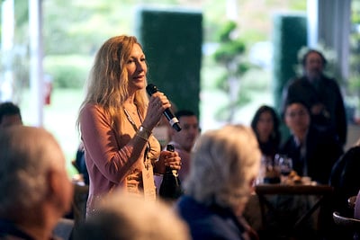 Woman speaking at Sonoma County Wine Auction