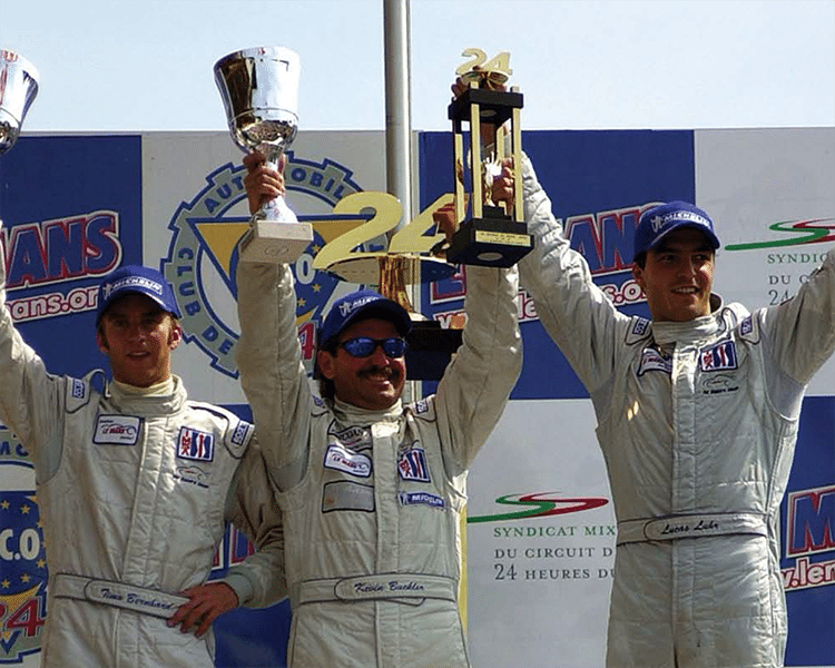 three racers with their trophies - lot for SCWA