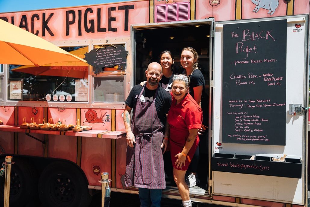 Black Pig Meat Co. Owners and workers in front of their food truck